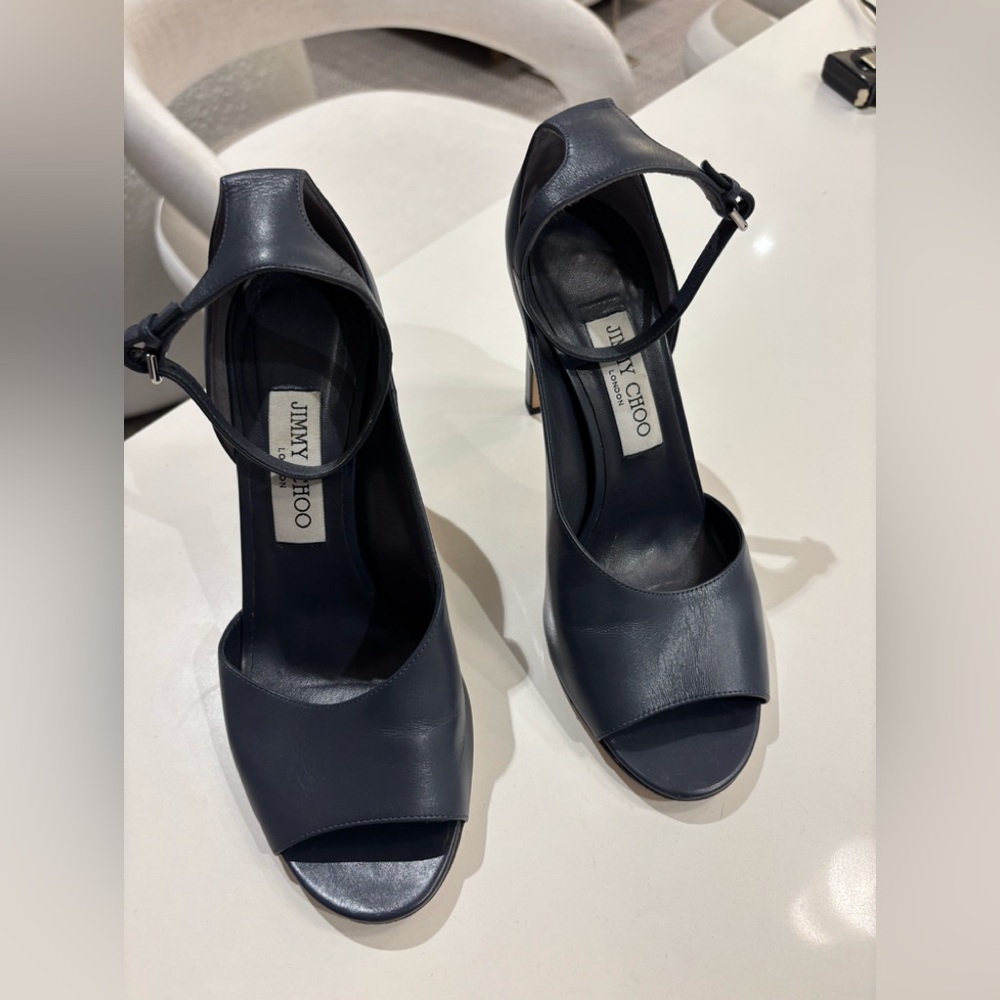 Jimmy Choo
D”Orsay sandals - Stormy Blue Leather
Theresa sandal
Barely worn